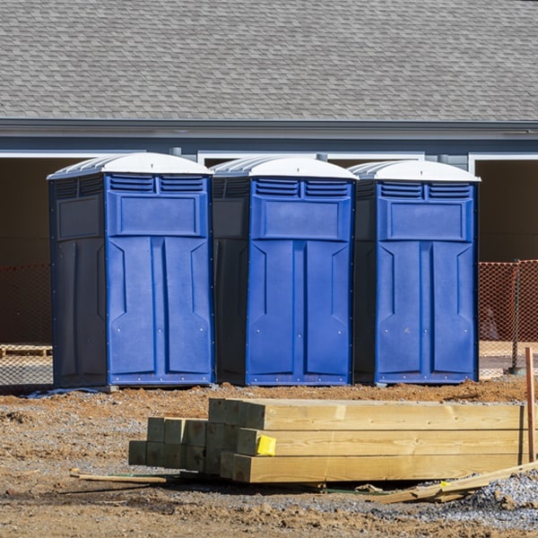 what is the cost difference between standard and deluxe portable restroom rentals in Lake Peekskill